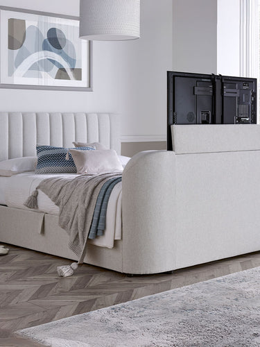natural cream upholstered tv bed with ottoman storage and tv lift